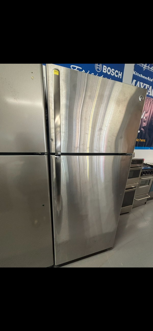 ge® energy star® 17.5 cu. ft. stainless steel top freezer refrigerator with upfront temperature controls