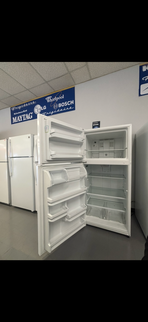 whirlpool® 18 cu. ft. white top freezer refrigerator with flexi slide bin